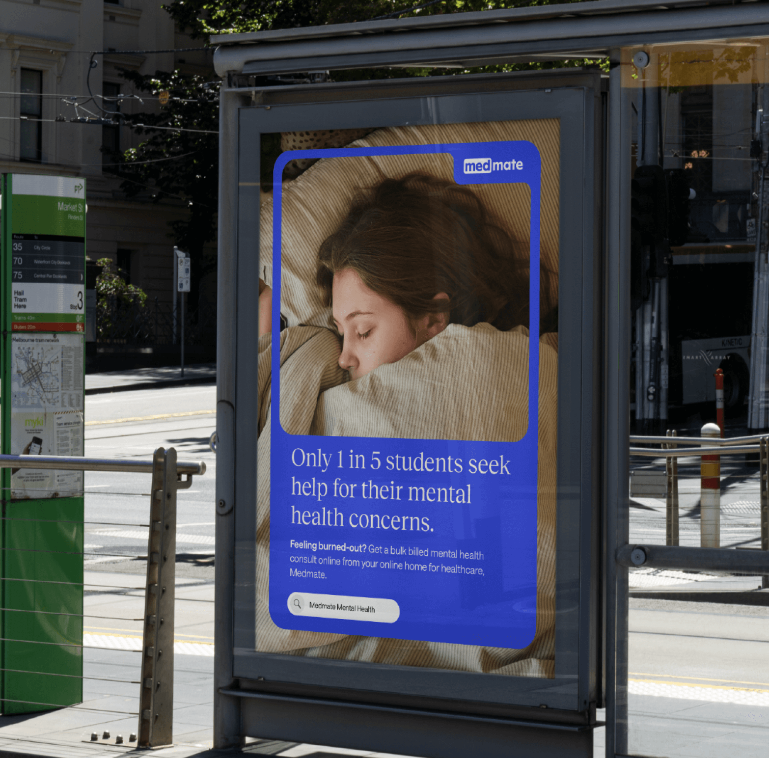 Medmate mental health out-of-home poster on a Melbourne tram stop